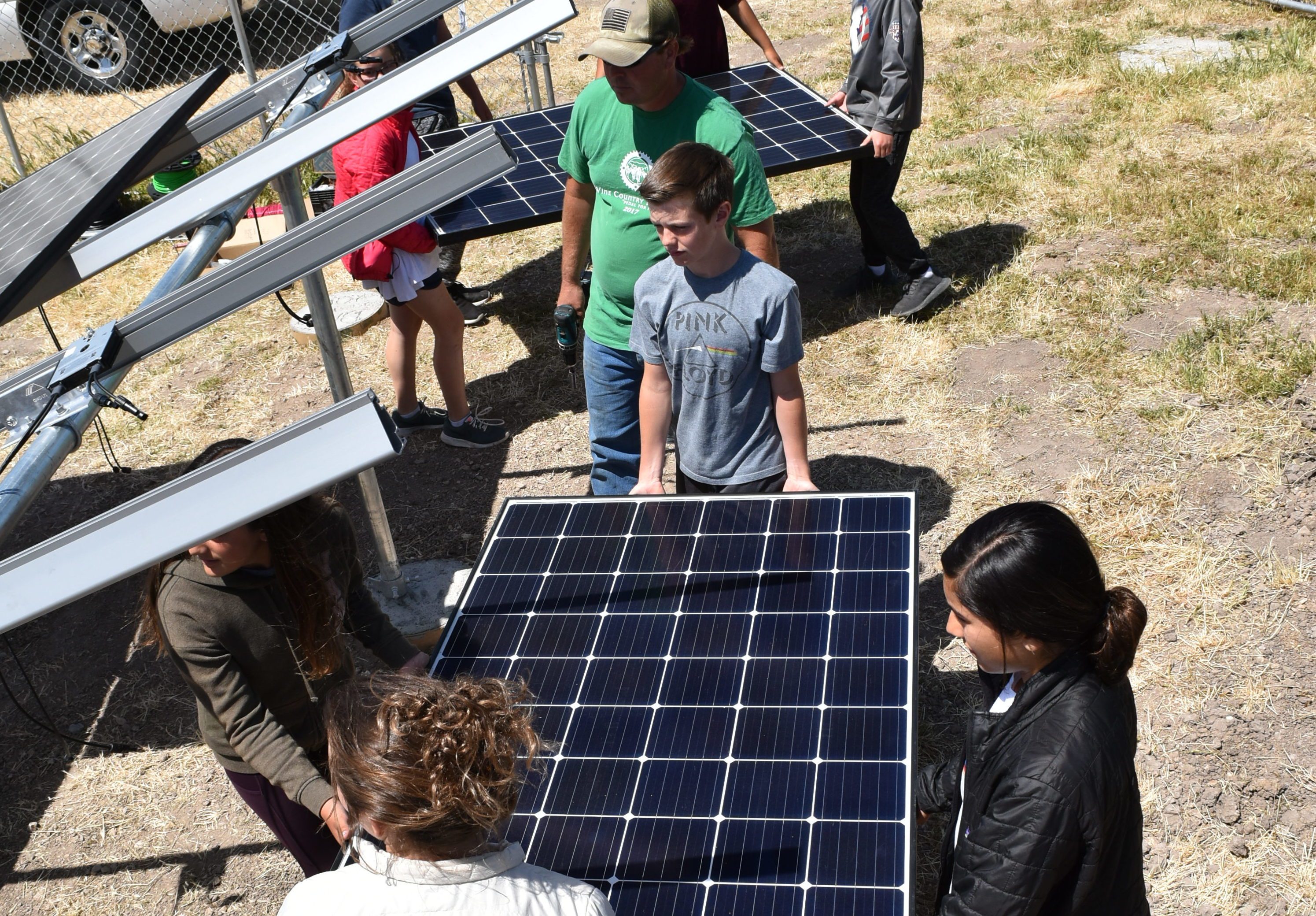 Dunn Middle Schoolers help install solar panels