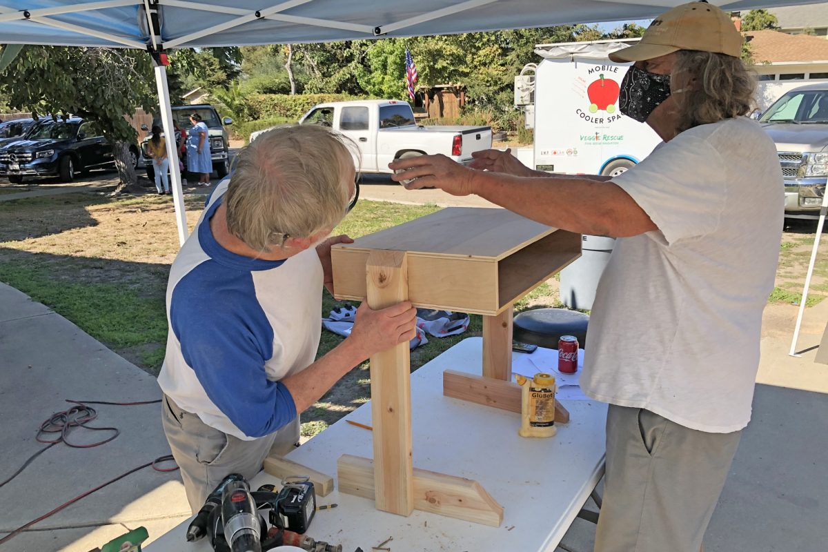 Los Alamos volunteers craft desks, chairs for students at home