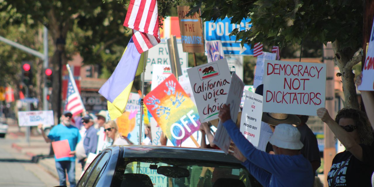Demonstrators in Solvang gather to ‘Protect Our Checks’
